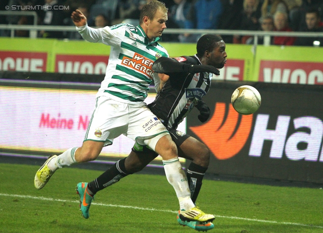 Sturm Graz - Rapid Wien
Oesterreichische Fussball Bundesliga, 14. Runde, SK Sturm Graz - SK Rapid Wien, Stadion Liebenau Graz, 03.11.2012. 

Foto zeigt Mario Sonnleitner (Rapid) und Richard Sukuta-Pasu (Sturm)
Schlüsselwörter: foul