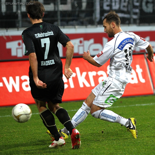 Innsbruck - Sturm Graz
Oesterreichische Fussball Bundesliga, 17. Runde,  FC Wacker Innsbruck - SK Sturm Graz, Tivoli Stadion Innsbruck, 24.11.2012. 

Foto zeigt Alexander Hauser (Innsbruck) und Michael Madl (Sturm)
