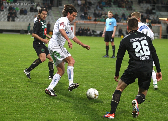 Innsbruck - Sturm Graz
Oesterreichische Fussball Bundesliga, 17. Runde,  FC Wacker Innsbruck - SK Sturm Graz, Tivoli Stadion Innsbruck, 24.11.2012. 

Foto zeigt Imre Szabics (Sturm) und Daniel Schuetz (Innsbruck)
