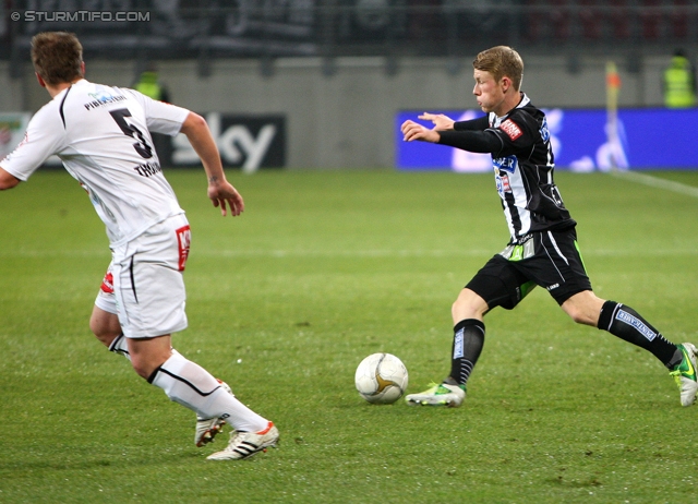 Wolfsberg - Sturm Graz
Oesterreichische Fussball Bundesliga, 13. Runde, Wolfsberg AC - SK Sturm Graz, Woerthereestadion Klagenfurt, 27.11.2012. 

Foto zeigt Christian Thonhofer (Wolfsberg) und Florian Kainz (Sturm)
