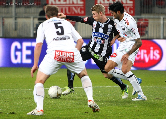 Wolfsberg - Sturm Graz
Oesterreichische Fussball Bundesliga, 13. Runde, Wolfsberg AC - SK Sturm Graz, Woerthereestadion Klagenfurt, 27.11.2012. 

Foto zeigt Christian Thonhofer (Wolfsberg), Florian Kainz (Sturm) und David De Paula Gallardo (Wolfsberg)
