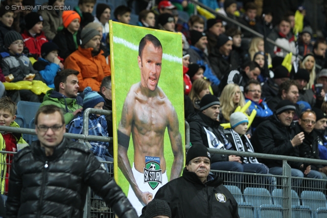 Sturm Graz - Wr. Neustadt
Oesterreichische Fussball Bundesliga, 18. Runde, SK Sturm Graz - SC Wiener Neustadt, Stadion Liebenau Graz, 01.12.2012. 

Foto zeigt Fans von Sturm mit einem Transparent von Mario Haas (Sturm)
