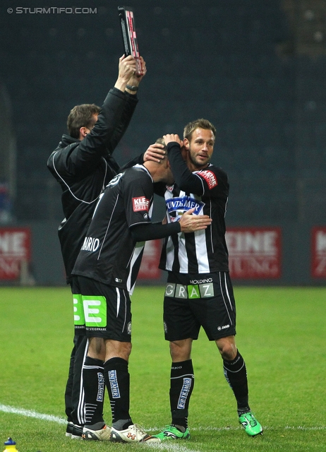 Sturm Graz - Wr. Neustadt
Oesterreichische Fussball Bundesliga, 18. Runde, SK Sturm Graz - SC Wiener Neustadt, Stadion Liebenau Graz, 01.12.2012. 

Foto zeigt Mario Haas (Sturm) und Martin Ehrenreich (Sturm)
