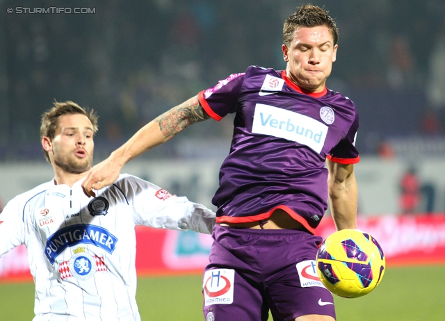 Austria Wien - Sturm Graz
Oesterreichische Fussball Bundesliga, 20. Runde, FK Austria Wien - SK Sturm Graz, Franz-Horr-Stadion Wien, 16.12.2012. 

Foto zeigt David Schloffer (Sturm) und Marko Stankovic (Austria)
