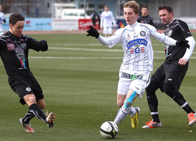 Gratkorn - Sturm Graz
Testspiel,  FC Gratkorn - SK Sturm Graz, Stadion Gratkorn, 12.01.2013. 

Foto zeigt Marc Andre Schmerboeck (Sturm) und Samir Muratovic (Gratkorn)
