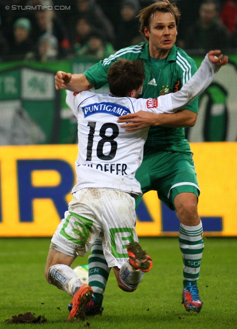 Rapid Wien - Sturm Graz
Oesterreichische Fussball Bundesliga, 23. Runde, SK Rapid Wien - SK Sturm Graz, Gerhard Hanappi Stadion Wien, 23.02.2013. 

Foto zeigt David Schloffer (Sturm) und Markus Heikkinen (Rapid)
