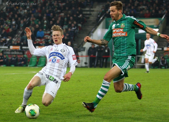 Rapid Wien - Sturm Graz
Oesterreichische Fussball Bundesliga, 23. Runde, SK Rapid Wien - SK Sturm Graz, Gerhard Hanappi Stadion Wien, 23.02.2013. 

Foto zeigt Florian Kainz (Sturm) und Guido Burgstaller (Rapid)
