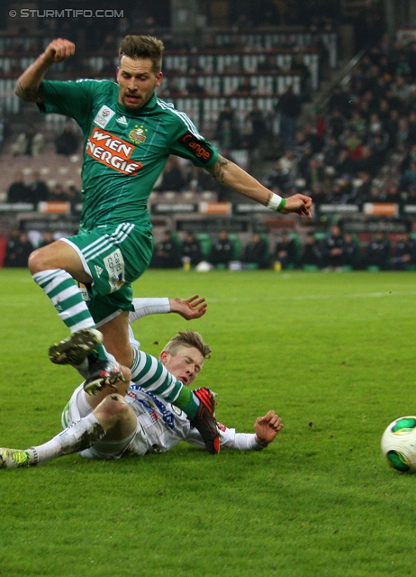 Rapid Wien - Sturm Graz
Oesterreichische Fussball Bundesliga, 23. Runde, SK Rapid Wien - SK Sturm Graz, Gerhard Hanappi Stadion Wien, 23.02.2013. 

Foto zeigt Guido Burgstaller (Rapid) und Florian Kainz (Sturm)
