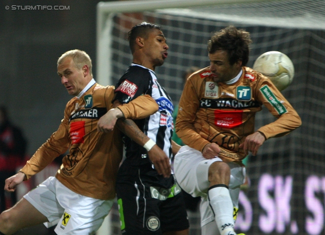 Sturm Graz - Innsbruck
Oesterreichische Fussball Bundesliga, 26. Runde, SK Sturm Graz - FC Wacker Innsbruck, Stadion Liebenau Graz, 16.03.2013. 

Foto zeigt Rubin Rafael Okotie (Sturm) und Alexander Hauser (Innsbruck)
