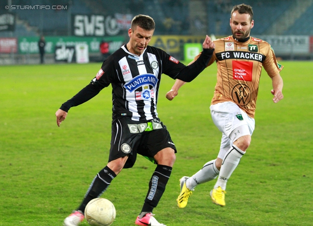 Sturm Graz - Innsbruck
Oesterreichische Fussball Bundesliga, 26. Runde, SK Sturm Graz - FC Wacker Innsbruck, Stadion Liebenau Graz, 16.03.2013. 

Foto zeigt Milan Dudic (Sturm) und Roman Wallner (Innsbruck)
