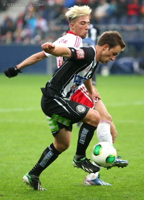 Salzburg - Sturm Graz
Oesterreichische Fussball Bundesliga, 28. Runde, FC RB Salzburg - SK Sturm Graz, Stadion Wals-Siezenheim, 07.04.2013. 

Foto zeigt Tobias Kainz (Sturm) und Kevin Kampl (Salzburg)
