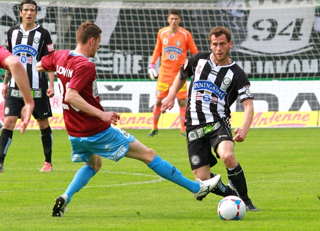 Sturm Graz - Mattersburg
Oesterreichische Fussball Bundesliga, 30. Runde, SK Sturm Graz - SV Mattersburg, Stadion Liebenau Graz, 20.04.2013. 

Foto zeigt Florian Lovin (Mattersburg) und Juergen Saeumel (Sturm)
