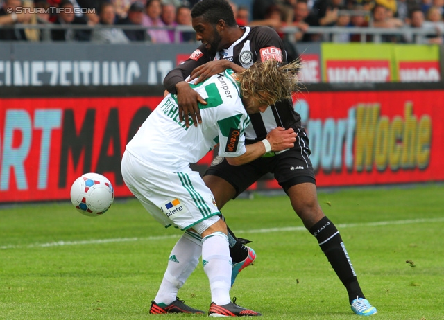 Sturm Graz - Rapid Wien
Oesterreichische Fussball Bundesliga, 32. Runde, SK Sturm Graz - SK Rapid Wien, Stadion Liebenau Graz, 05.05.2013. 

Foto zeigt Harald Pichler (Rapid) und Richard Sukuta-Pasu (Sturm)
