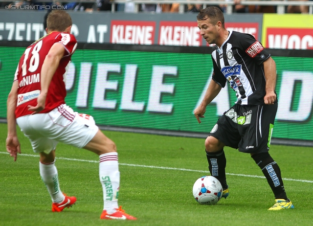 Sturm Graz - Ried
Oesterreichische Fussball Bundesliga, 34. Runde, SK Sturm Graz - SV Ried, Stadion Liebenau Graz, 19.05.2013. 

Foto zeigt Thomas Hinum (Ried) und Christoph Kroepfl (Sturm)
