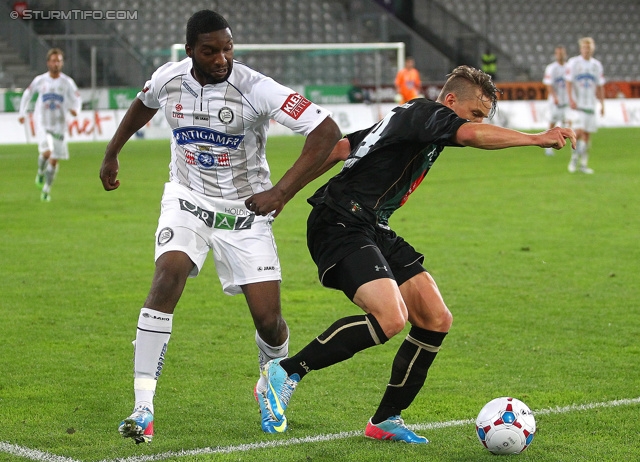 Wacker Innsbruck - Sturm Graz
Oesterreichische Fussball Bundesliga, 35. Runde, FC Wacker Innsbruck - SK Sturm Graz, Tivoli Neu Innsbruck, 22.05.2013. 

Foto zeigt Richard Sukuta-Pasu (Sturm) und Marco Kofler (Innsbruck)
