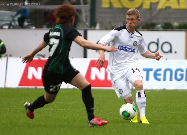 Breidablik - Sturm Graz
UEFA Europa League Qualifikation 2. Runde, FC Breidablik Kopavagur - SK Sturm Graz, Stadion Kopavogsvollur, 18.07.2013. 

Foto zeigt Tomas Gardarsson (Breidablik) und Florian Kainz (Sturm)
