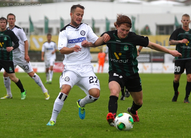 Breidablik - Sturm Graz
UEFA Europa League Qualifikation 2. Runde, FC Breidablik Kopavagur - SK Sturm Graz, Stadion Kopavogsvollur, 18.07.2013. 

Foto zeigt Christian Klem (Sturm) und Tomas Gardarsson (Breidablik) 
