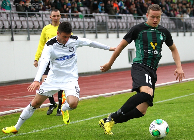 Breidablik - Sturm Graz
UEFA Europa League Qualifikation 2. Runde, FC Breidablik Kopavagur - SK Sturm Graz, Stadion Kopavogsvollur, 18.07.2013. 

Foto zeigt Marco Djuricin (Sturm) und Sverrir Ingason (Breidablik)
