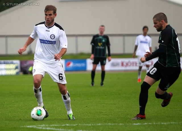 Breidablik - Sturm Graz
UEFA Europa League Qualifikation 2. Runde, FC Breidablik Kopavagur - SK Sturm Graz, Stadion Kopavogsvollur, 18.07.2013. 

Foto zeigt Manuel Weber (Sturm) und Gudjon Lydsson (Breidablik)
