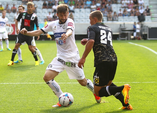 Wacker Innsbruck - Sturm Graz
Oesterreichische Fussball Bundesliga, 1. Runde, FC Wacker Innsbruck - SK Sturm Graz, Tivoli Neu Innsbruck, 21.07.2013. 

Foto zeigt Aleksandar Todorovski (Sturm) und Christopher Wernitznig (Innsbruck)
