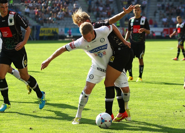 Wacker Innsbruck - Sturm Graz
Oesterreichische Fussball Bundesliga, 1. Runde, FC Wacker Innsbruck - SK Sturm Graz, Tivoli Neu Innsbruck, 21.07.2013. 

Foto zeigt Robert Beric (Sturm)
