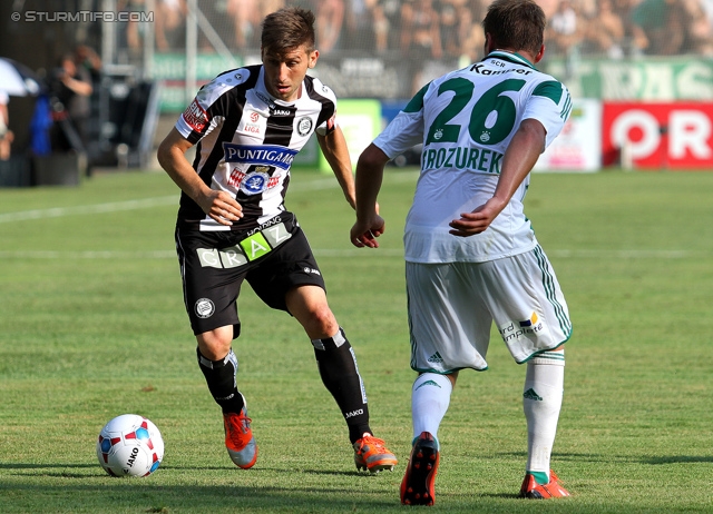 Sturm Graz - Rapid Wien
Oesterreichische Fussball Bundesliga, 3. Runde, SK Sturm Graz - SK Rapid Wien, Stadion Liebenau Graz, 04.08.2013. 

Foto zeigt Aleksandar Todorovski (Sturm) und Lukas Grozurek (Rapid)
