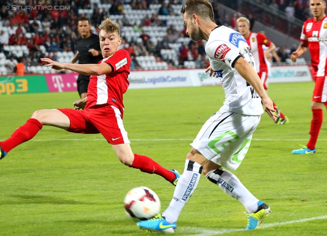 Admira Wacker - Sturm Graz
Oesterreichische Fussball Bundesliga, 4. Runde, FC Admira Wacker Moedling - SK Sturm Graz, Stadion Suedstadt Maria Enzersdorf, 10.08.2013. 

Foto zeigt Michael Madl (Sturm)
