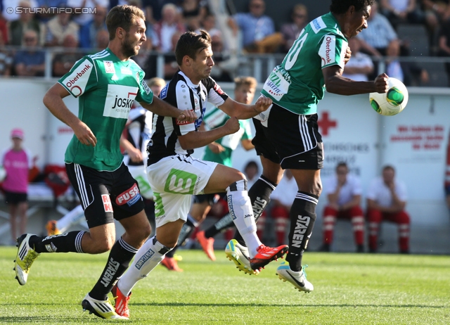 Ried - Sturm Graz
Oesterreichische Fussball Bundesliga, 6. Runde, SV Ried - SK Sturm Graz, Arena Ried, 24.08.2013. 

Foto zeigt Daniel Offenbacher (Sturm) und Sandro Jose Ferreira Da Silva (Ried)
