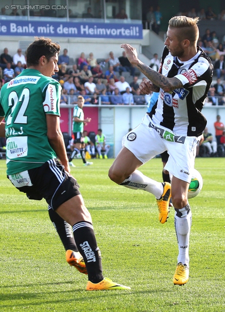 Ried - Sturm Graz
Oesterreichische Fussball Bundesliga, 6. Runde, SV Ried - SK Sturm Graz, Arena Ried, 24.08.2013. 

Foto zeigt Robert Zulj (Ried) und Patrick Wolf (Sturm)
