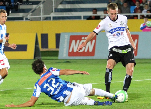 Wiener Neustadt - Sturm Graz
Oesterreichische Fussball Bundesliga, 8. Runde, SC Wiener Neustadt - SK Sturm Graz, Stadion Wiener Neustadt, 14.09.2013. 

Foto zeigt Mattias Sereinig (Wr. Neustadt) und Robert Beric (Sturm)
Schlüsselwörter: tor