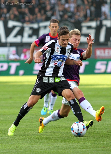 Sturm Graz - Austria Wien
Oesterreichische Fussball Bundesliga, 9. Runde, SK Sturm Graz - FK Austria Wien, Stadion Liebenau Graz, 21.09.2013. 

Foto zeigt Daniel Offenbacher (Sturm) und Daniel Royer (Austria)
