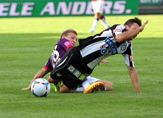 Sturm Graz - Austria Wien
Oesterreichische Fussball Bundesliga, 9. Runde, SK Sturm Graz - FK Austria Wien, Stadion Liebenau Graz, 21.09.2013. 

Foto zeigt Daniel Offenbacher (Sturm) und Daniel Royer (Austria)
