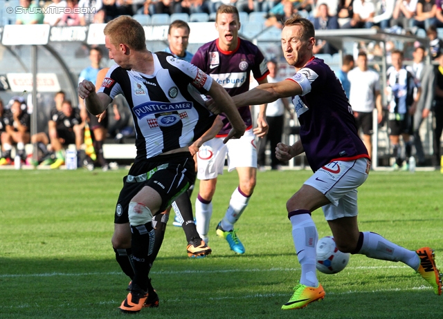 Sturm Graz - Austria Wien
Oesterreichische Fussball Bundesliga, 9. Runde, SK Sturm Graz - FK Austria Wien, Stadion Liebenau Graz, 21.09.2013. 

Foto zeigt Robert Beric (Sturm) und Manuel Ortlechner (Austria)
