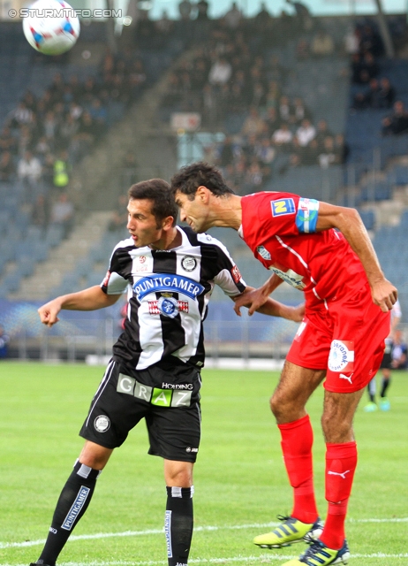 Sturm Graz - Wiener Neustadt
OEFB Cup, 2. Runde, SK Sturm Graz - SC Wiener Neustadt, Stadion Liebenau Graz, 25.09.2013. 

Foto zeigt Anel Hadzic (Sturm) und Peter Hlinka (Wr. Neustadt)
