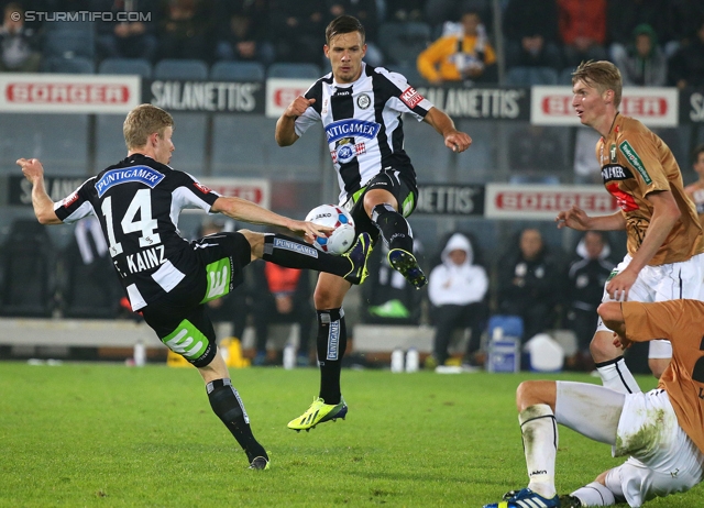 Sturm Graz - Innsbruck
Oesterreichische Fussball Bundesliga, 10. Runde, SK Sturm Graz - FC Wacker Innsbruck, Stadion Liebenau Graz, 28.09.2013. 

Foto zeigt Florian Kainz (Sturm) und Daniel Offenbacher (Sturm)
