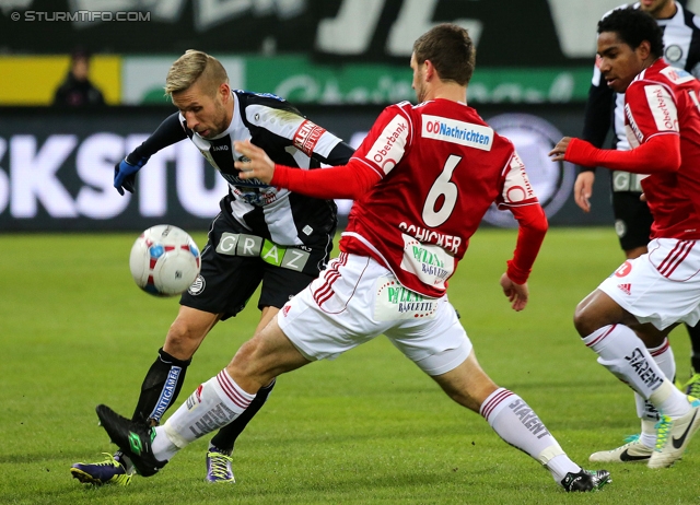 Sturm Graz - Ried
Oesterreichische Fussball Bundesliga, 15. Runde, SK Sturm Graz - SV Ried, Stadion Liebenau Graz, 27.11.2013. 

Foto zeigt Patrick Wolf (Sturm) und Andreas Schicker (Ried)
