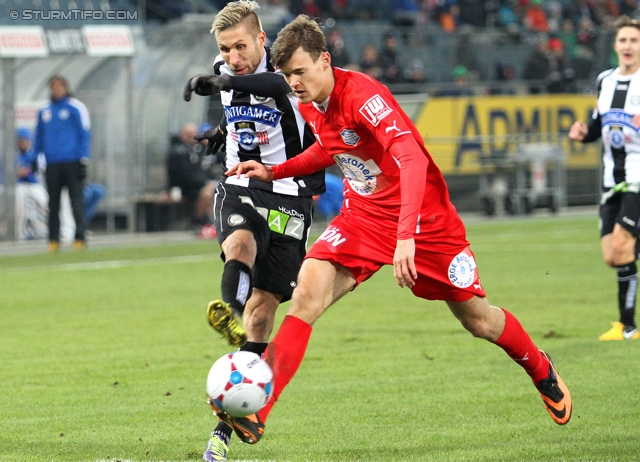 Sturm Graz - Wr. Neustadt
Oesterreichische Fussball Bundesliga, 17. Runde, SK Sturm Graz - SC Wiener Neustadt, Stadion Liebenau Graz, 30.11.2013. 

Foto zeigt Patrick Wolf (Sturm) und Stefan Stangl (Wr. Neustadt)
