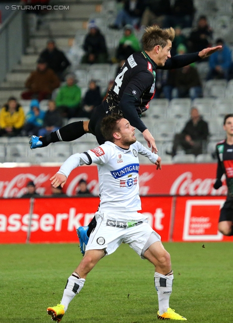 Innsbruck - Sturm Graz
Oesterreichische Fussball Bundesliga, 19. Runde,FC Wacker Innsbruck - SK Sturm Graz, Tivoli Stadion Innsbruck, 07.12.2013. 

Foto zeigt Philipp Huetter (Sturm) und Thomas Bergmann (Innsbruck)
