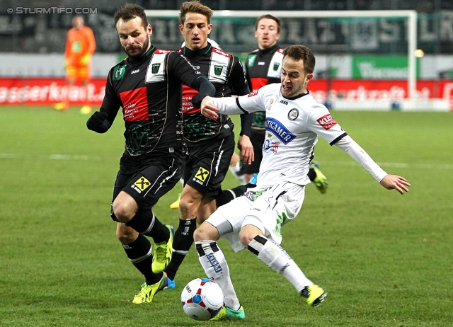 Innsbruck - Sturm Graz
Oesterreichische Fussball Bundesliga, 19. Runde,FC Wacker Innsbruck - SK Sturm Graz, Tivoli Stadion Innsbruck, 07.12.2013. 

Foto zeigt Roman Wallner (Innsbruck) und Christian Klem (Sturm)
