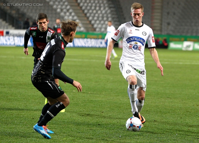 Innsbruck - Sturm Graz
Oesterreichische Fussball Bundesliga, 19. Runde,FC Wacker Innsbruck - SK Sturm Graz, Tivoli Stadion Innsbruck, 07.12.2013. 

Foto zeigt Thomas Bergmann (Innsbruck) und Robert Beric (Sturm)
