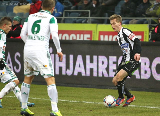 Sturm Graz - Rapid Wien
Oesterreichische Fussball Bundesliga, 21. Runde, SK Sturm Graz - SK Rapid Wien, Stadion Liebenau Graz, 18.12.2013. 

Foto zeigt Mario Sonnleitner (Rapid) und Marc Andre Schmerboeck (Sturm)
