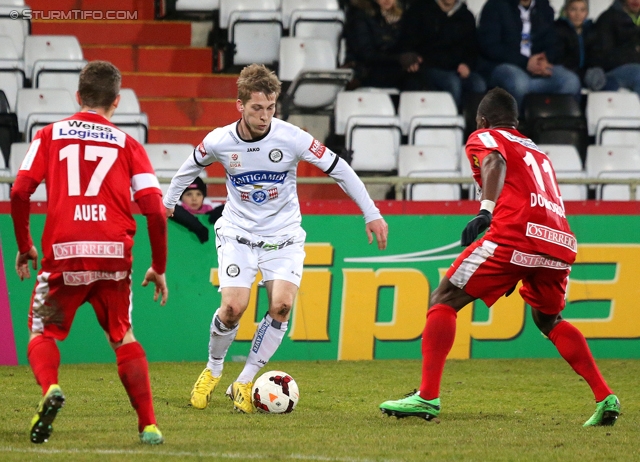 Admira Wacker - Sturm Graz
Oesterreichische Fussball Bundesliga, 22. Runde, FC Admira Wacker - SK Sturm Graz, Stadion Suedstadt Maria Enzersdorf, 08.02.2014. 

Foto zeigt Stephan Auer (Admira), Marc Andre Schmerboeck (Sturm) und Wilfried Domoraud (Admira)
