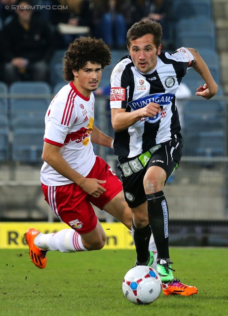 Sturm Graz - Salzburg
Oesterreichische Fussball Bundesliga, 23. Runde, SK Sturm Graz -  FC RB Salzburg, Stadion Liebenau Graz, 15.02.2014. 

Foto zeigt Andre Ramalho Silva (Salzburg) und Anel Hadzic (Sturm)
