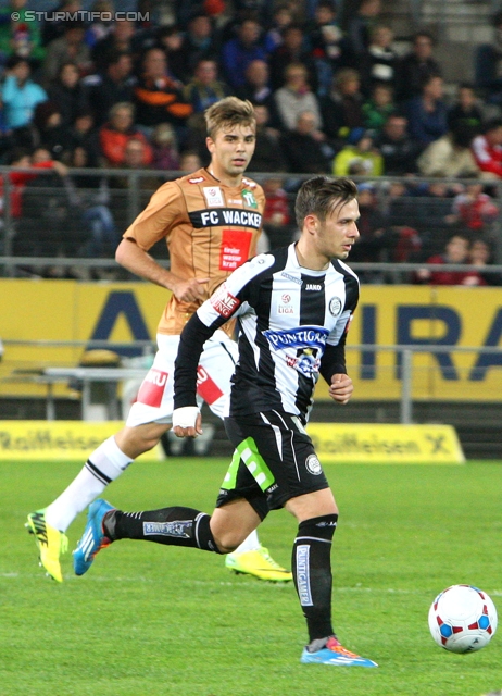 Sturm Graz - Wacker Innsbruck
Oesterreichische Fussball Bundesliga, 28. Runde, SK Sturm Graz -  FC Wacker Innsbruck, Stadion Liebenau Graz, 22.03.2014. 

Foto zeigt Lukas Hinterseer (Innsbruck), Daniel Offenbacher (Sturm)
