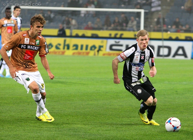 Sturm Graz - Wacker Innsbruck
Oesterreichische Fussball Bundesliga, 28. Runde, SK Sturm Graz -  FC Wacker Innsbruck, Stadion Liebenau Graz, 22.03.2014. 

Foto zeigt Lukas Hinterseer (Innsbruck), Florian Kainz (Sturm)
