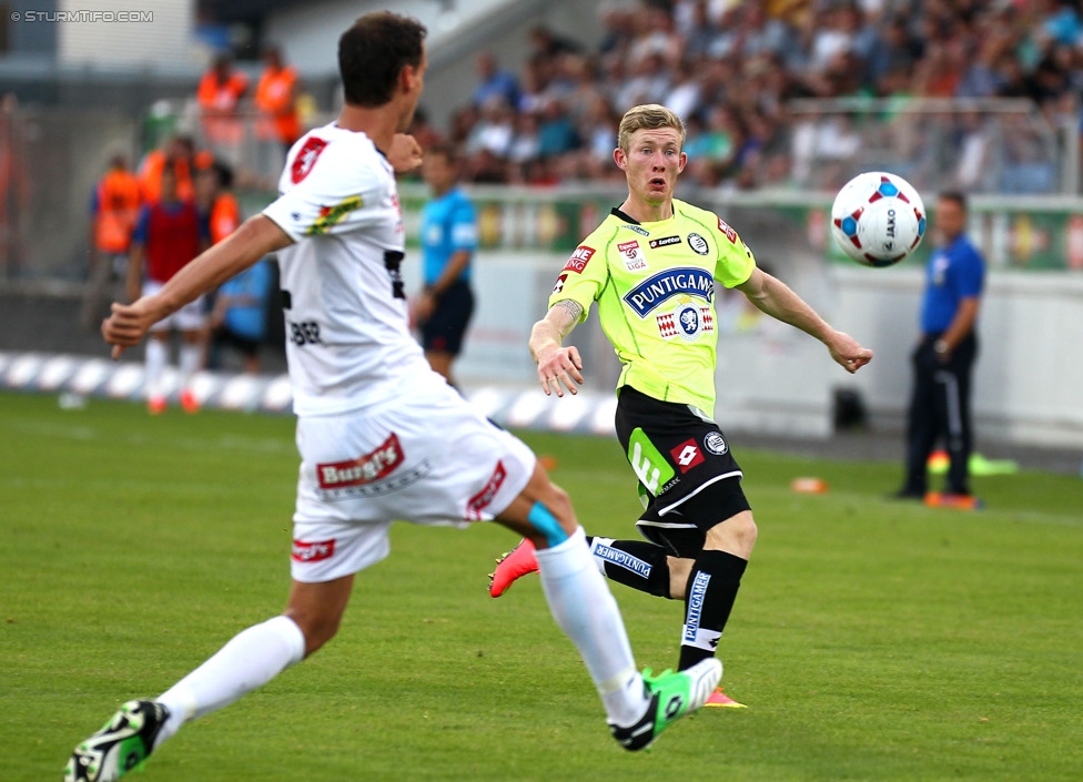 Altach - Sturm Graz
Oesterreichische Fussball Bundesliga, 1. Runde, SC Rheindorf Altach - SK Sturm Graz, Stadion Schnabelholz Altach, 19.07.2014. 

Foto zeigt Alexander Poellhuber (Altach) und Florian Kainz (Sturm)
