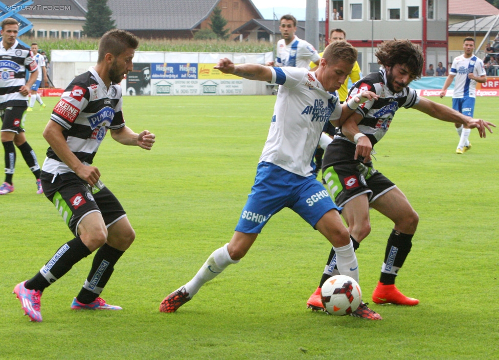 Groedig - Sturm Graz
Oesterreichische Fussball Bundesliga, 2. Runde, SV Groedig - SK Sturm Graz, Untersbergarena Groedig, 27.07.2014. 

Foto zeigt Aleksandar Todorovski (Sturm) und Naim Sharifi (Sturm)
