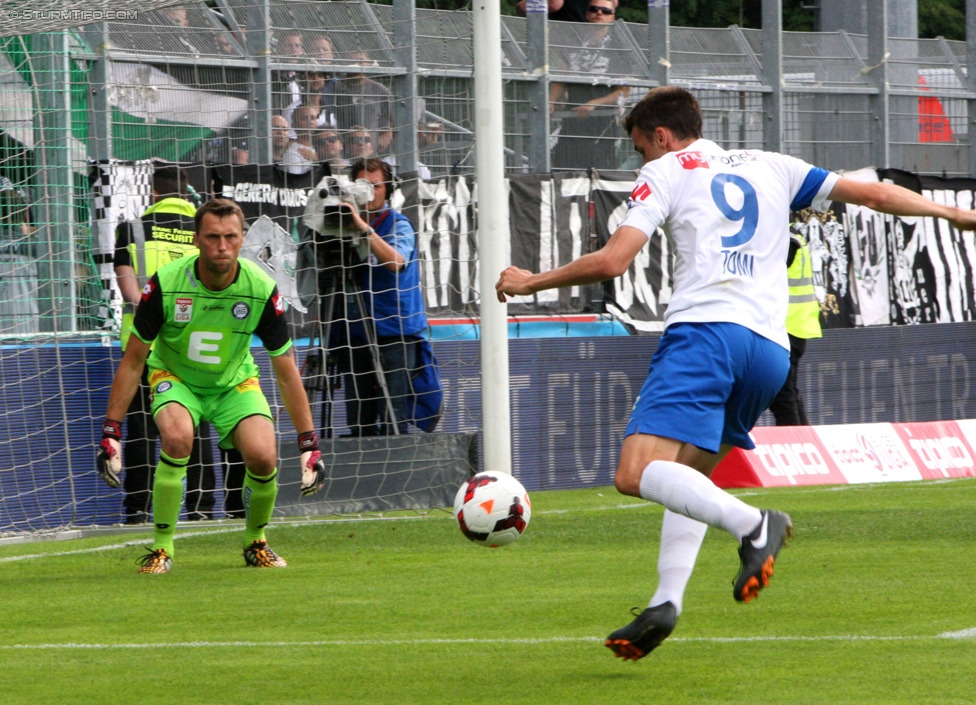 Groedig - Sturm Graz
Oesterreichische Fussball Bundesliga, 2. Runde, SV Groedig - SK Sturm Graz, Untersbergarena Groedig, 27.07.2014. 

Foto zeigt Christian Gratzei (Sturm) und Tomas Esteban Correa Miranda (Groedig)
