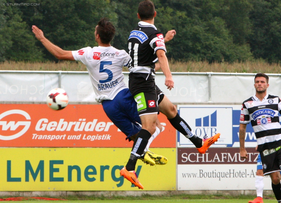 Groedig - Sturm Graz
Oesterreichische Fussball Bundesliga, 2. Runde, SV Groedig - SK Sturm Graz, Untersbergarena Groedig, 27.07.2014. 

Foto zeigt Timo Brauer (Groedig) und Josip Tadic (Sturm)
Schlüsselwörter: kopfball