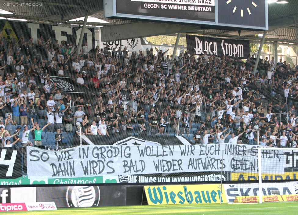 Sturm Graz - Wiener Neustadt
Oesterreichische Fussball Bundesliga, 3. Runde, SK Sturm Graz - SC Wiener Neustadt, Stadion Liebenau Graz, 02.08.2014. 

Foto zeigt Fans von Sturm mit einem Spruchband
